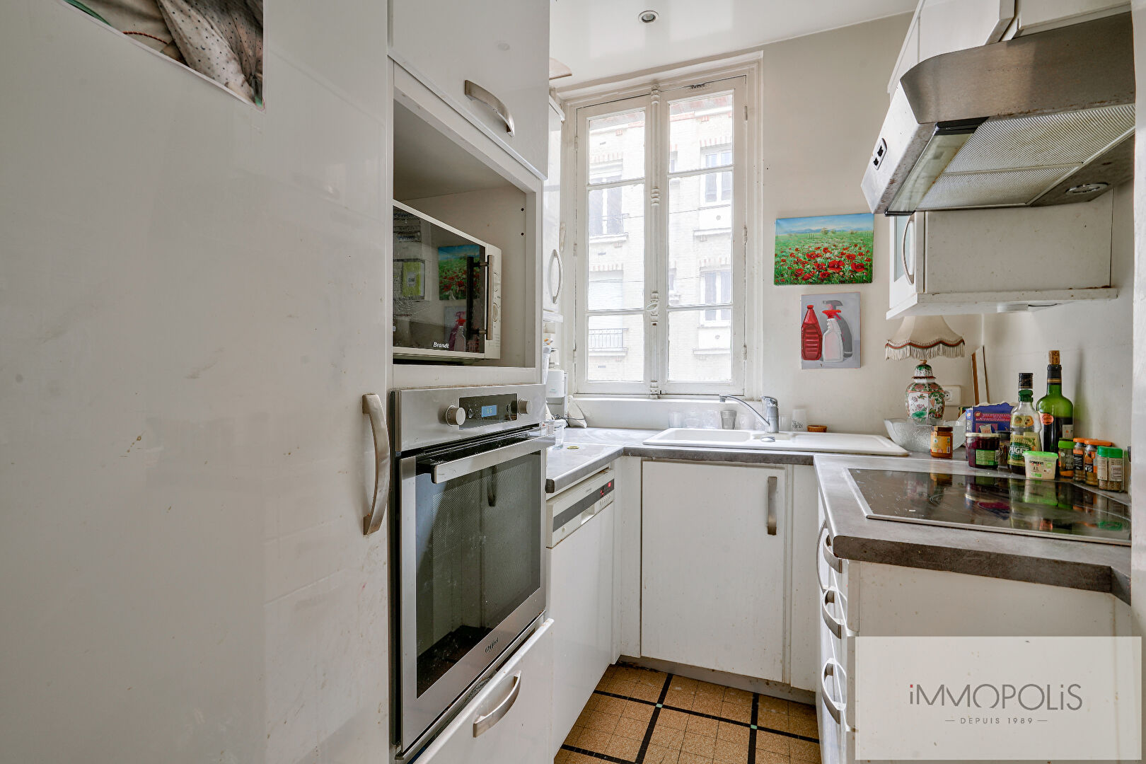 Opportunité rare : vente en nue – propriété d’un charmant appartement à moderniser, quartier Lamarck-Caulaincourt 7 Opportunité rare : vente en nue – propriété d’un charmant appartement à moderniser, quartier Lamarck-Caulaincourt 7